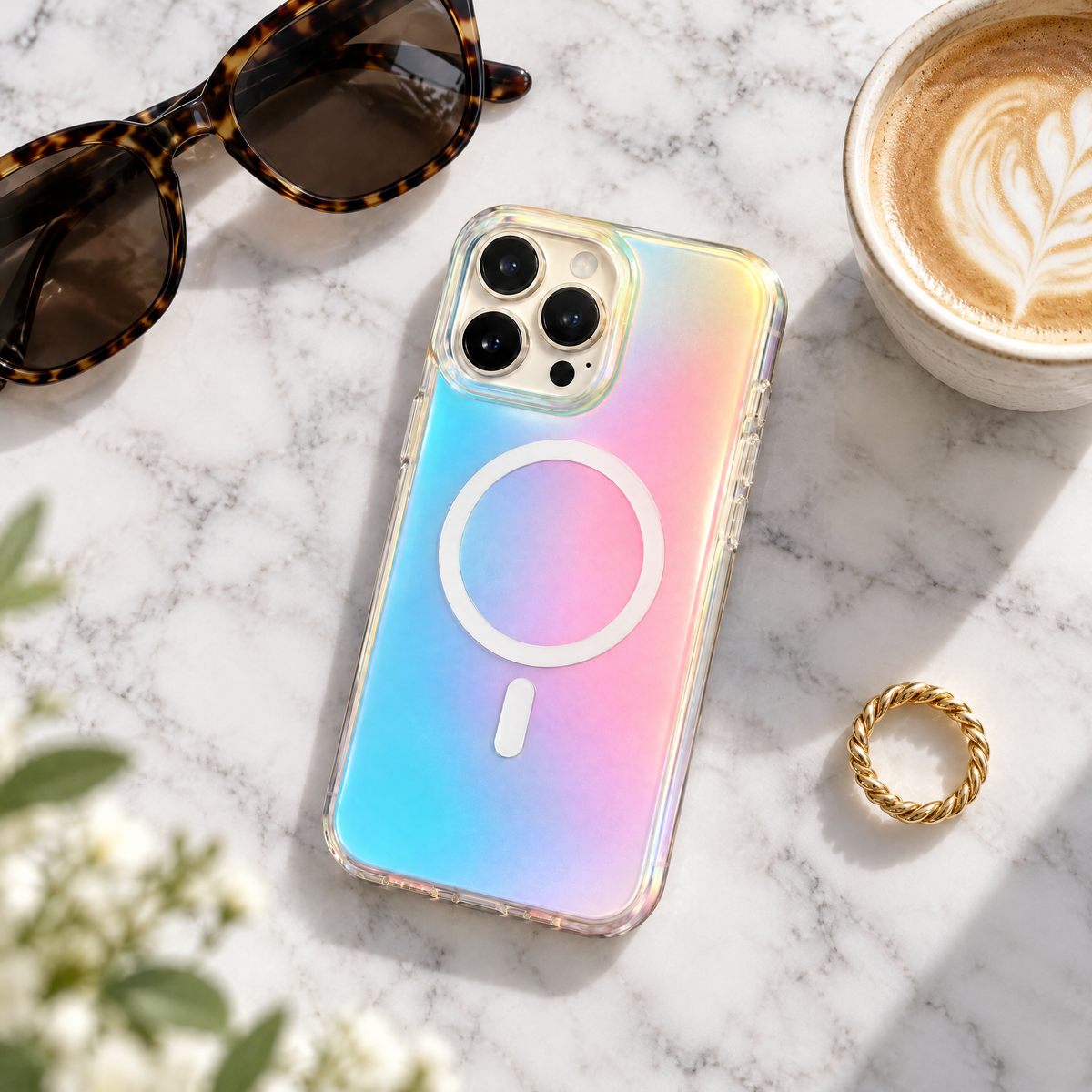 AuraShift pearl case on a marble table with sunglasses and coffee