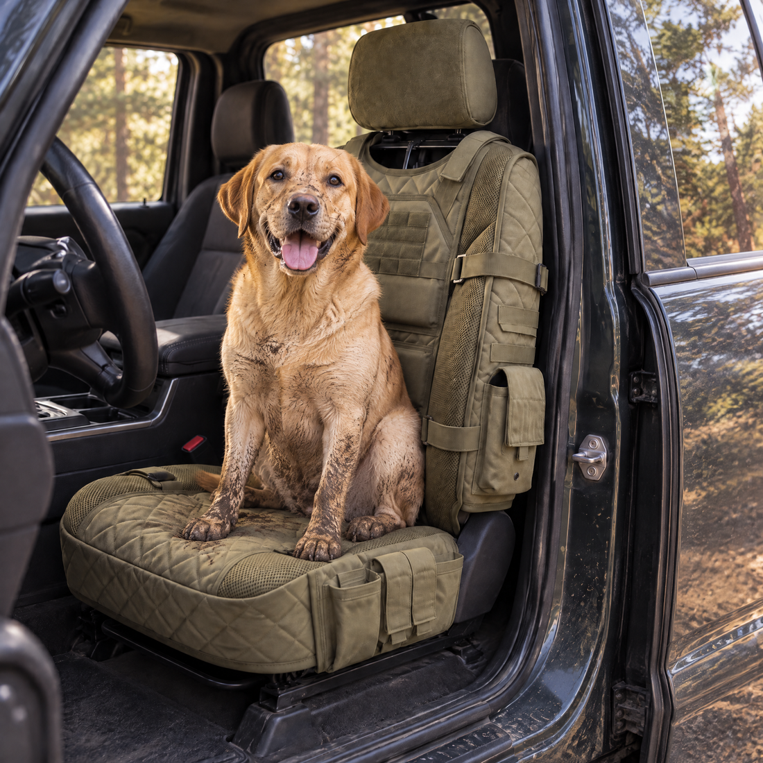 Dog sitting on a FieldRig-covered seat after a muddy walk