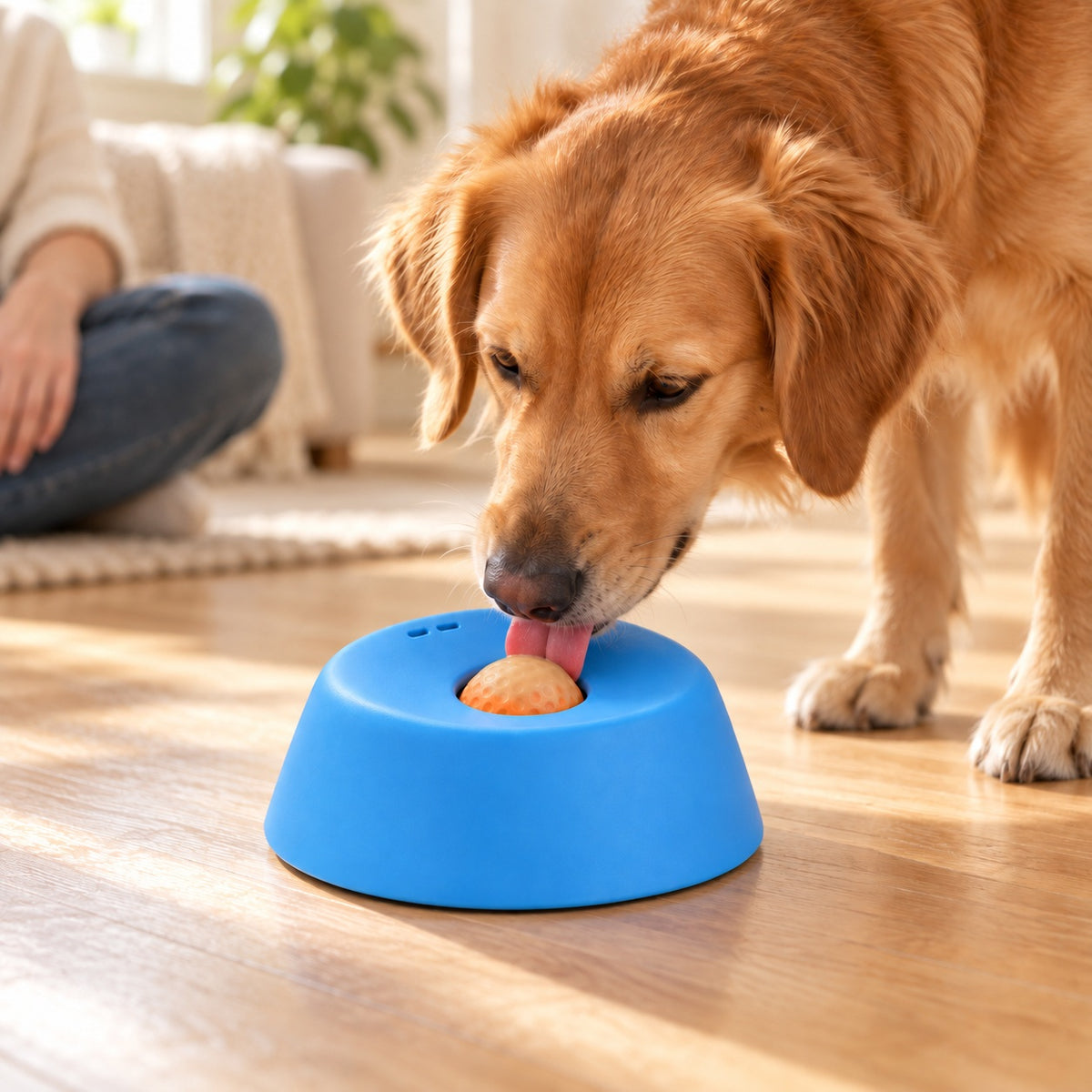 Pawturn play — generated lifestyle view of dog licking a liquid-treat-coated orange rolling ball in a blue bowl
