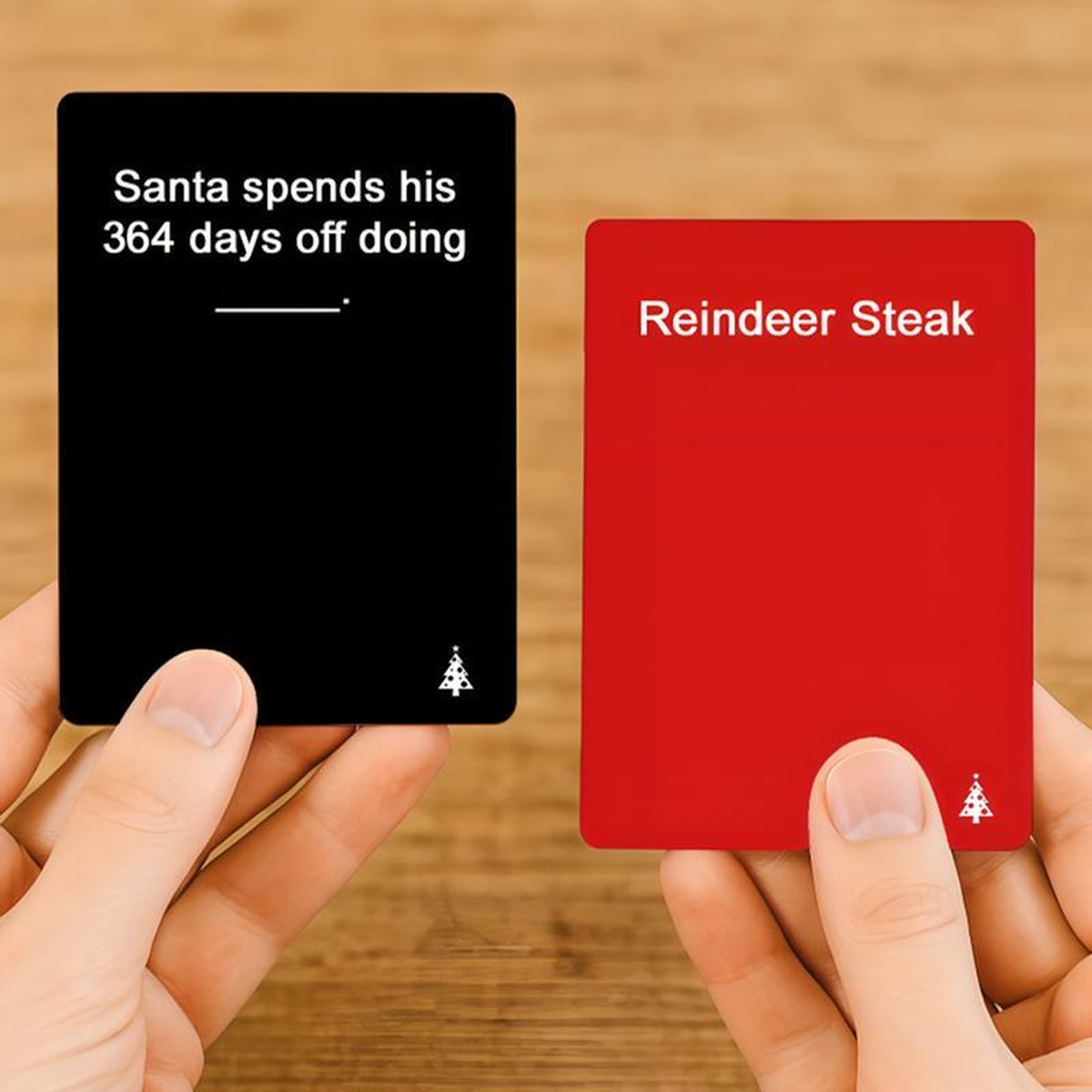 A black prompt card and a red answer card