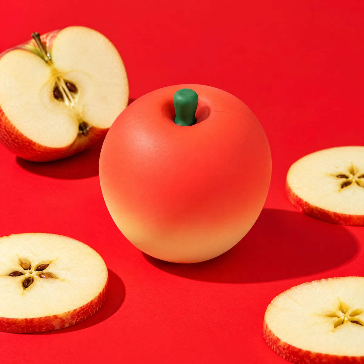 Pip with a halved apple