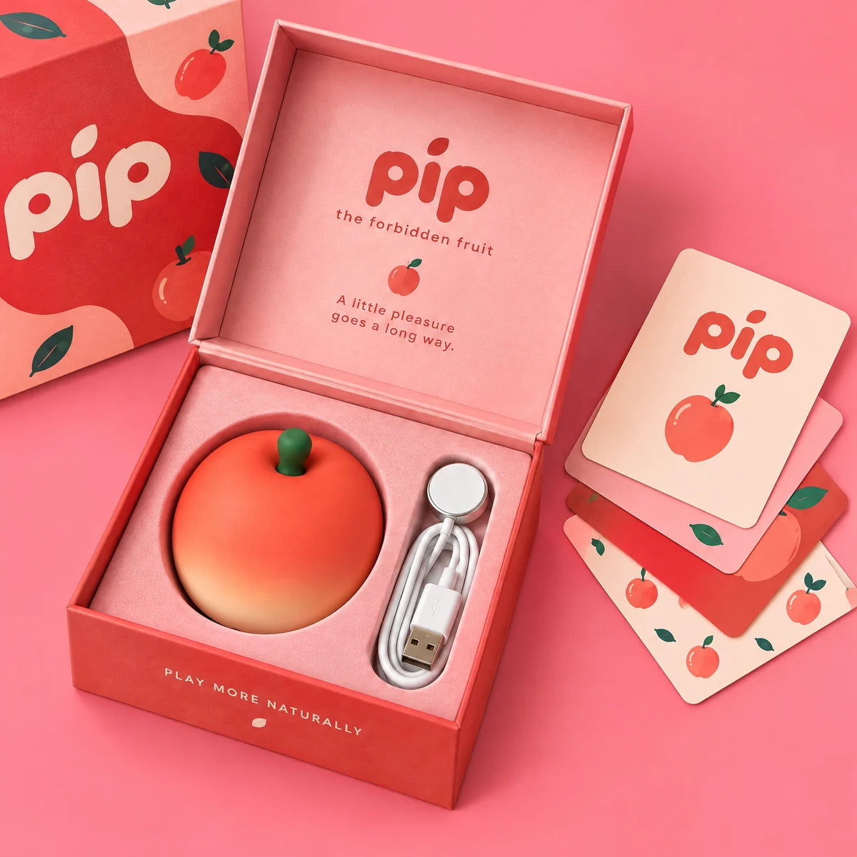 Pip in its open gift box with charging cable