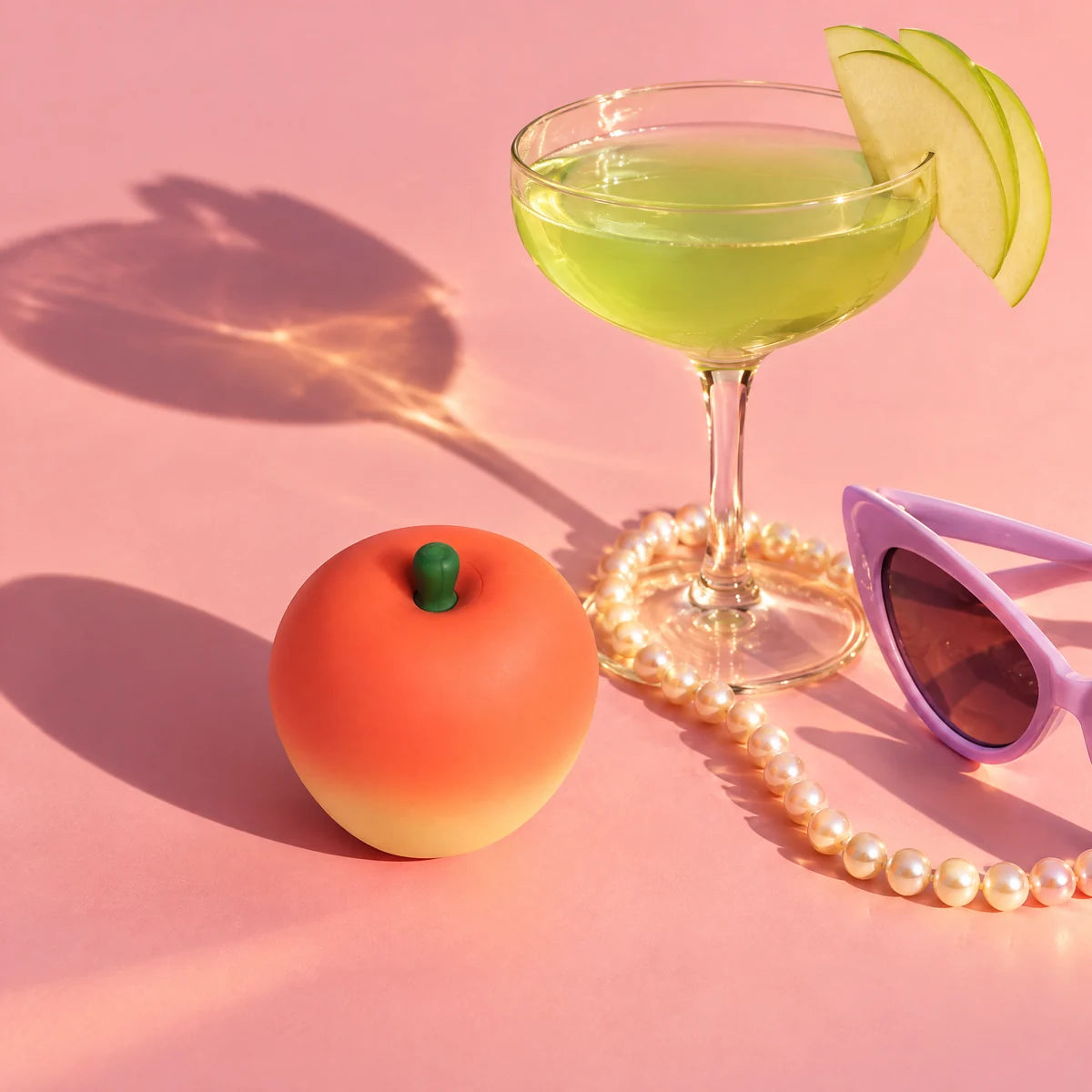 Pip with an appletini and sunglasses
